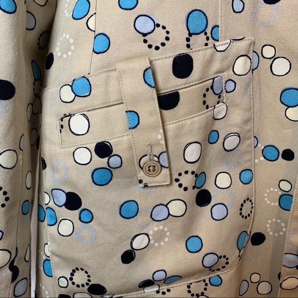 I.e. Tan trench coat with Mod circle design. - Picture 3 of 8